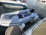 Hydraulic launch cradle with electric start tender